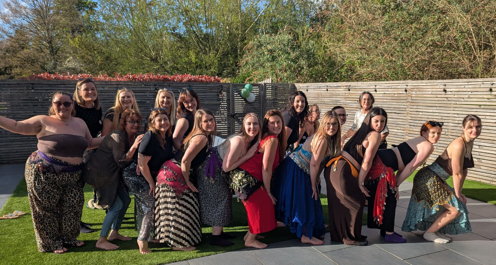 A group of women outside after belly dancing