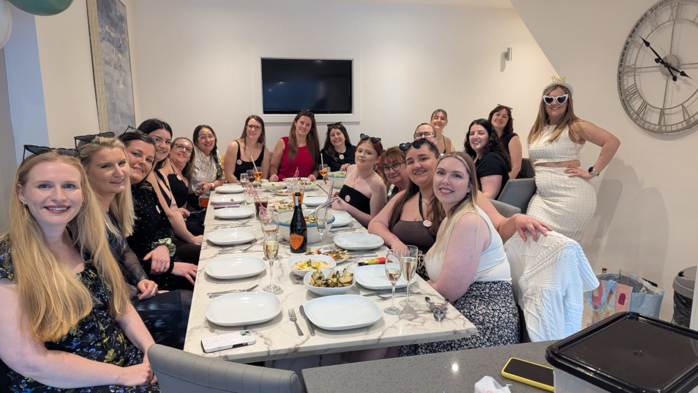 Large group of women eating Lebanese food at a hen party
